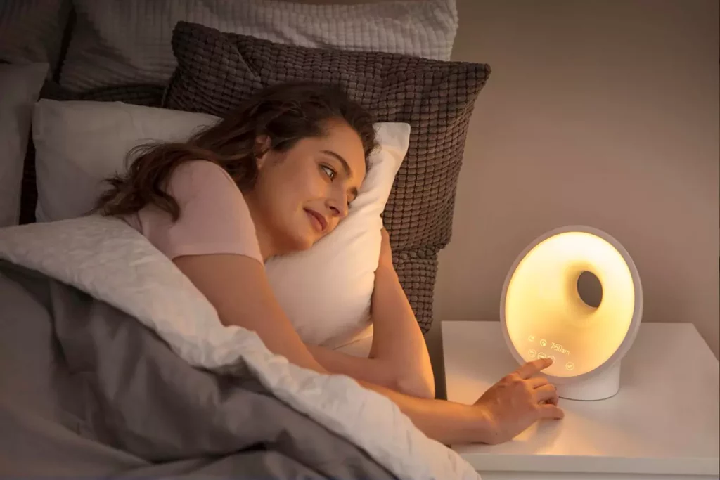 Women wake up with philips connected sunrise alarm